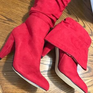 Red mid calf size 9 boots. The red is bit darker than what is in the photo